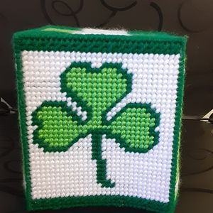 Crocheted tissue box cover.